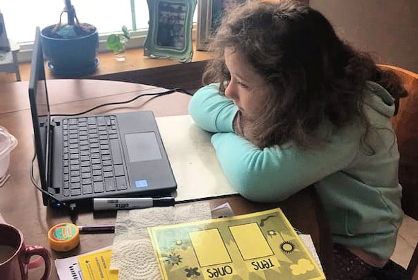 Abigael Huston prepares for her online Grade 2 class. During online learning, her class had a chuckle after a voice filter caused her teacher to sound like a chipmunk.