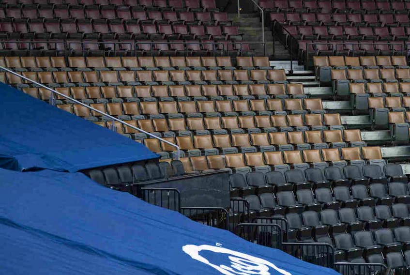  A general view of the empty seats at the Scotiabank Arena in Toronto, some sections covered by tarps, before Saturday’s game between the Senators and Maple Leafs.