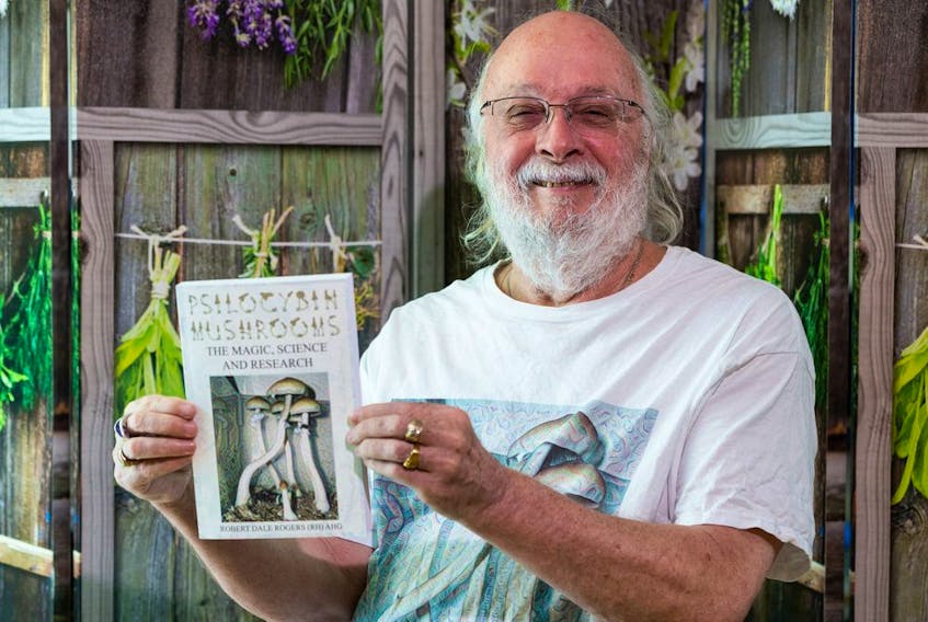 Herbalist Robert Rogers with his new book Psilocybin Mushrooms.