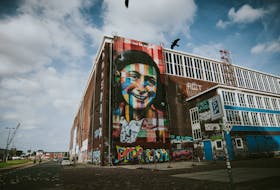 A mural of Anne Frank in Amsterdam, painted by Brazilian street artist Eduardo Kobra in 2016. — Ronni Kurtz/Unsplash