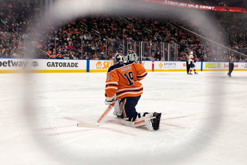 Edmonton Oilers goaltender Mikko Koskinen (19) stretches while playing the Florida Panthers at Rogers Place in Edmonton on Thursday, Jan. 20, 2022. 