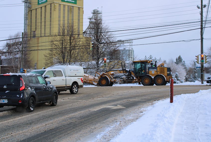 Plows, like this one from the Town of Truro, are often busy clearing up the streets during and after snowfall.