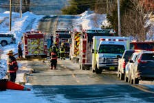 The 500 block of Town Road in Falmouth was blocked to traffic Jan. 21 as firefighters worked to extinguish a basement fire. 