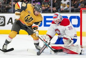 Canadiens goaltender Sam Montembeault makes a save against Golden Knights' William Carrier during the second period at T-Mobile Arena in Las Vegas Thursday night. 