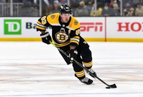 Winger Brad Marchand left Thursday's Boston Bruins game with an injury.