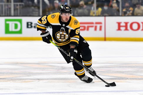 Winger Brad Marchand left Thursday's Boston Bruins game with an injury.