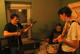 Liam Ryan, left, Jacob Cherwhick and Nick Hunt make up the St. John's-area band Swimming. The release of their first full-length album, That’s OK, is slated for October 2022.