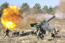 Ukrainians and Canadians do training exercises to get ready for large scale International military drills on Yavorivsky training ground, near Lviv in western Ukraine, in a file photo from April 2021.