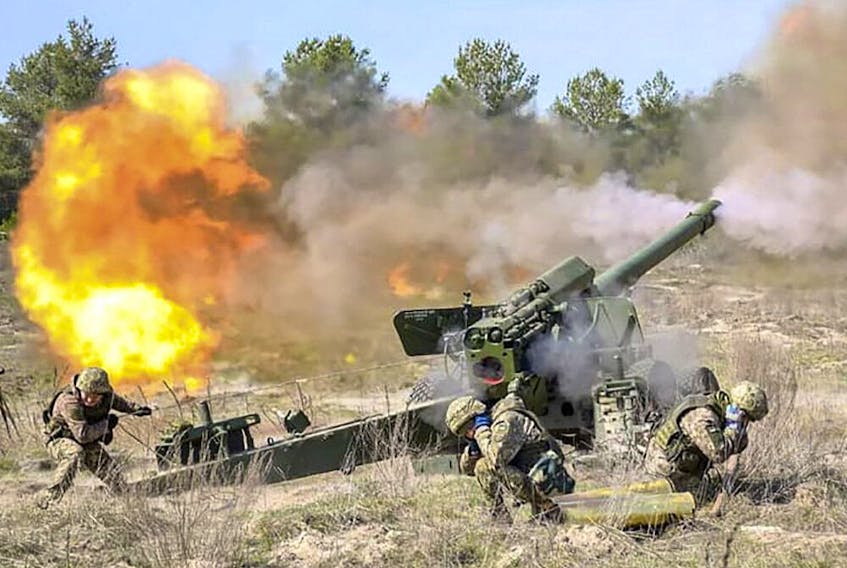 Ukrainians and Canadians do training exercises to get ready for large scale International military drills on Yavorivsky training ground, near Lviv in western Ukraine, in a file photo from April 2021.