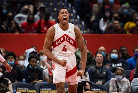 Scottie Barnes #4 of the Toronto Raptors celebrates after a play against the Washington Wizards during the second half at Capital One Arena on January 21, 2022 in Washington, DC.
