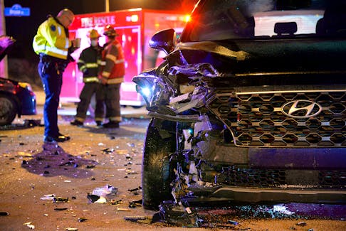 Two vehicles were significantly damaged following a crash on Kenmount Road at the Donovans industrial park Saturday night. Keith Gosse/The Telegram