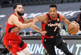 CJ McCollum #3 of the Portland Trail Blazers drives against Fred VanVleet #23 of the Toronto Raptors during the first half of their basketball game at the Scotiabank Arena on January 23.