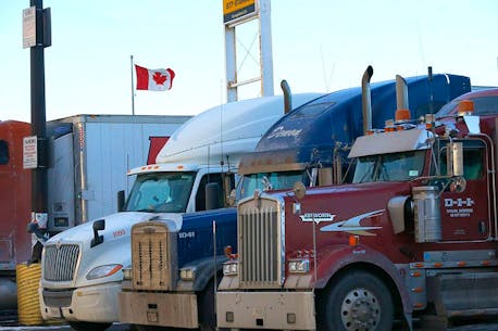 National truckers group denounces highway protests by anti-vaccine-mandate truck convoy