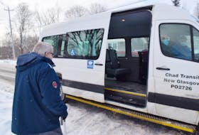 Joe Hunter of Stellarton prepares to board a CHAD Transit van headed to Antigonish, where he receives dialysis three times a week.
