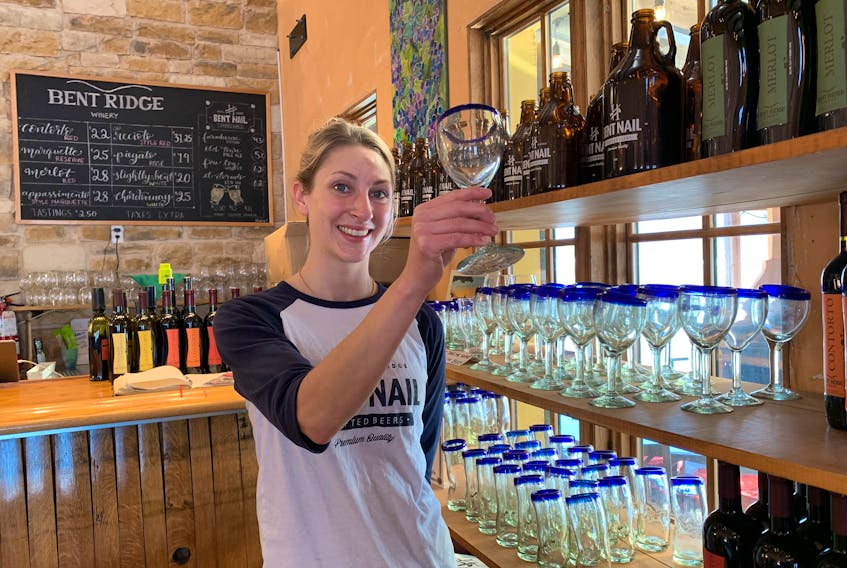 Salome Myers, the manager at Bent Ridge Winery, inspects some of the handmade Mexican glassware that’s for sale at the popular winery in Martock. This summer, the winery is expanding its operations to include a special events pavilion capable of accommodating upwards of 150 people. 