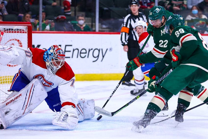 Minnesota Wild left-wing Kevin Fiala (22) scores on Montreal Canadiens' Michael McNiven during the third period at Xcel Energy Center on Jan. 24, 2022; Saint Paul, Minn. 