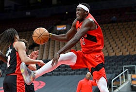 Raptors forward Pascal Siakam battles for a rebound with Portland forward Trendon Watford on Sunday. USA TODAY Sports