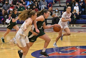 The UPEI Panthers’ Devon Lawlor, second left, dribbles the ball up the floor during an Atlantic University Sport Women’s Basketball Conference game against the Acadia Axewomen in Wolfville, N.S., earlier this season. Lawlor, from Millcove, P.E.I., is in her first season of eligibility with the Panthers. 