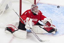 Goalie Devon Levi makes a save against Russia during semifinal action at the World Junior Hockey Championship in Edmonton last year.