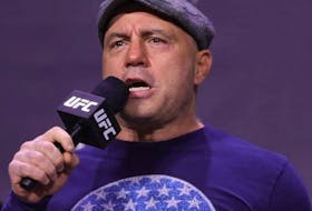 Joe Rogan introduces fighters during the UFC 269 ceremonial weigh-in  at MGM Grand Garden Arena on December 10, 2021 in Las Vegas, Nevada.
