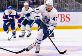 Toronto Maple Leafs left wing Pierre Engvall skates across center ice against the New York Islanders during the third period at UBS Arena. 