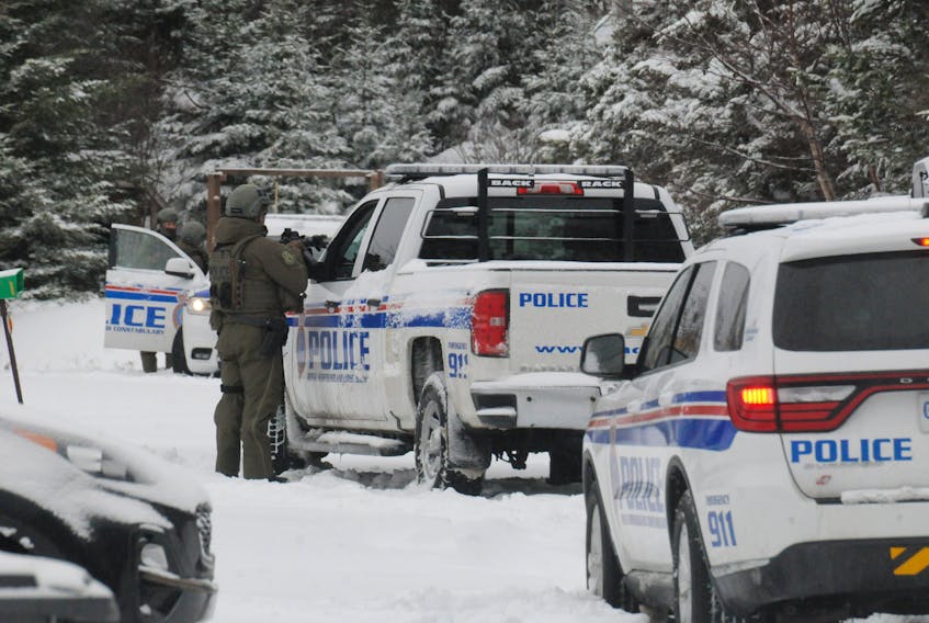 Members of the RNC's tactics and rescue unit outside a residence on Gosse’s Lane in Torbay on Sunday afternoon, Jan. 23. TELEGRAM FILE PHOTO
