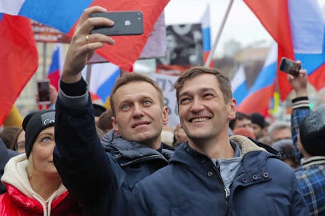 Russia puts jailed Kremlin critic Navalny's brother on wanted list
