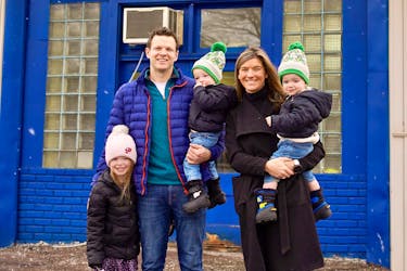 Heather MacAulay, right, new co-owner of Sterns Launderers & Dry Cleaners, says the plan is to take things one day at a time with no changes in how the business operates. MacAulay and her partner, Andrew Bonnell, left, along with their three children, from left, Charlotte, Leo and Louie, stand outside their new business in Charlottetown.