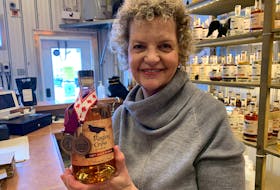 Raging Crow Distillery president Jill Linquist holds a bottle of Can’t Call it B**rbon that won a silver medal and was named the Best Whiskey Spirt at the 2022 Canadian Whiskey Awards. Darrell Cole – SaltWire Network