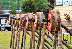 Double-bitted axes wait in the line of the targets for the next throw at the World Double-bit Axe Throwing Championships in Hallefors, Sweden in 2019. The international competition will be hosted in the Municipality of Barrington this summer. Suzy Atwood photo

