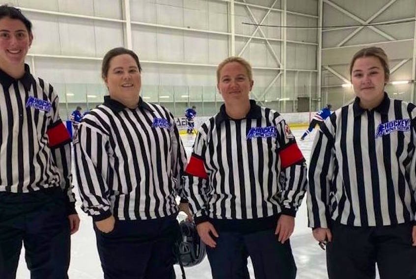 In November, history was made for the Cape Breton Blizzard Female Hockey Association when all four officials on the ice for an under-18 game were females. In total, 11 female officials are currently working minor hockey games in the Cape Breton Regional Municipality this year. From left, Blaire MacKinnon, Laura Gillis, Amanda MacInnis, and Madison Larade. PHOTO CONTRIBUTED/AMANDA MACINNIS