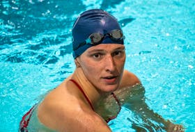 Lia Thomas, a transgender woman, finishes the 200-yard freestyle for the University of Pennsylvania at an Ivy League swim meet against Harvard University in Cambridge, Massachusetts, on January 22, 2022.  