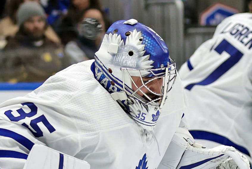 Toronto Maple Leafs goaltender Petr Mrazek makes a save against the New York Islanders in the second period of an NHL hockey game Saturday, Jan. 22, 2022, in Elmont, N.Y.  