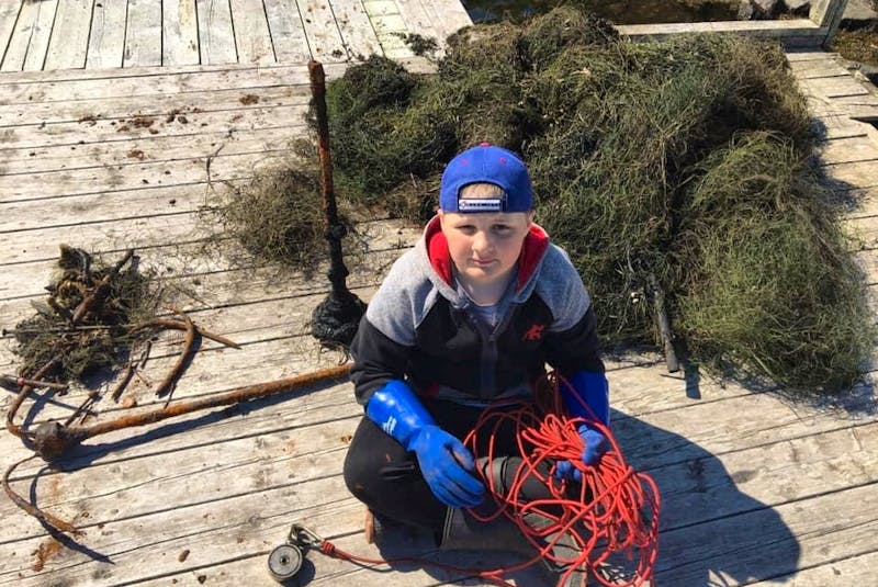 Cole Brookings, from Hickman’s Harbour, NL, developed an unusual pandemic hobby: pulling up trash that had been tossed in the harbour. All of the items pictured here were pulled out of the water using a magnetic fishing pole.