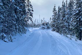 A groomer repairs a section of a managed snowmobile trail on the west coast of the island earlier this month. -CONTRIBUTED FILE PHOTO