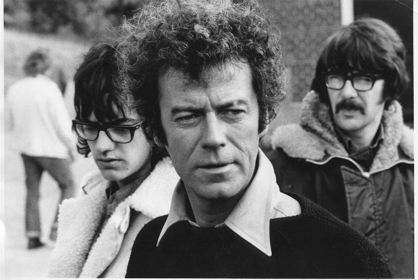 Gordon Pinsent on the set of "The Rowdyman" in 1971. At left is assistant art director Richard Brooke. Lloyd Price of Corner Brook is at right. Courtesy of John Eckert