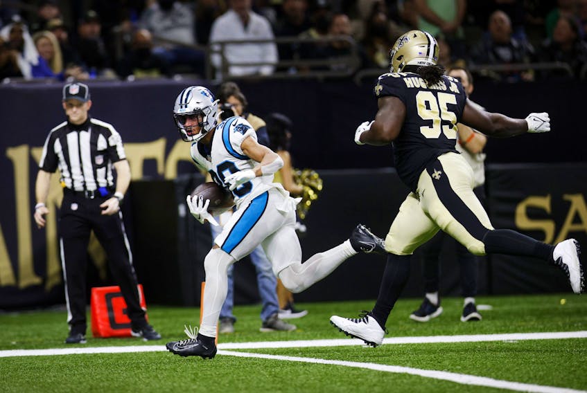 Chuba Hubbard of the Carolina Panthers scores a touchdown in the second quarter of the game against the New Orleans Saints.