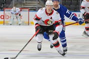 Thomas Chabot (72) of the Ottawa Senators chases back up ice for a puck against the Toronto Maple Leafs during an NHL game at Scotiabank Arena on Jan. 1, 2022 in Toronto, Ontario, Canada. 