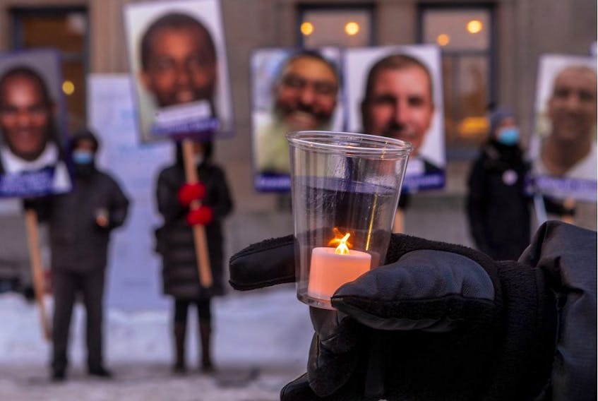  Montrealers mark the fifth anniversary of the Quebec City Mosque shootings in Montreal on Saturday, Jan. 29, 2022.