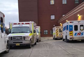 Upwards of 11 ambulances wait outside the emergency department at the Cape Breton Regional Hospital in Sydney. CONTRIBUTED • FACEBOOK