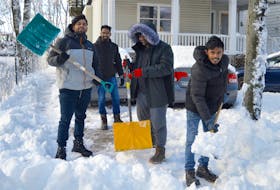 In this file photo from 2021, a group of Cape Breton University students from India tackle the first snowfall of the year. From left, Noel Mendez, Joseph Varghese, Boni Joseph and Pranav Prakash. DAVID JALA/CAPE BRETON POST

