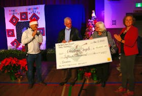 Bert and Shari Frizzel, of Halifax but formerly from Windsor, presented West Hants Mayor Abraham Zebian and the 2021 Hants County Christmas Angels coordinator Ruth Anne Greenough with a cheque for $15,000. JIM IVEY