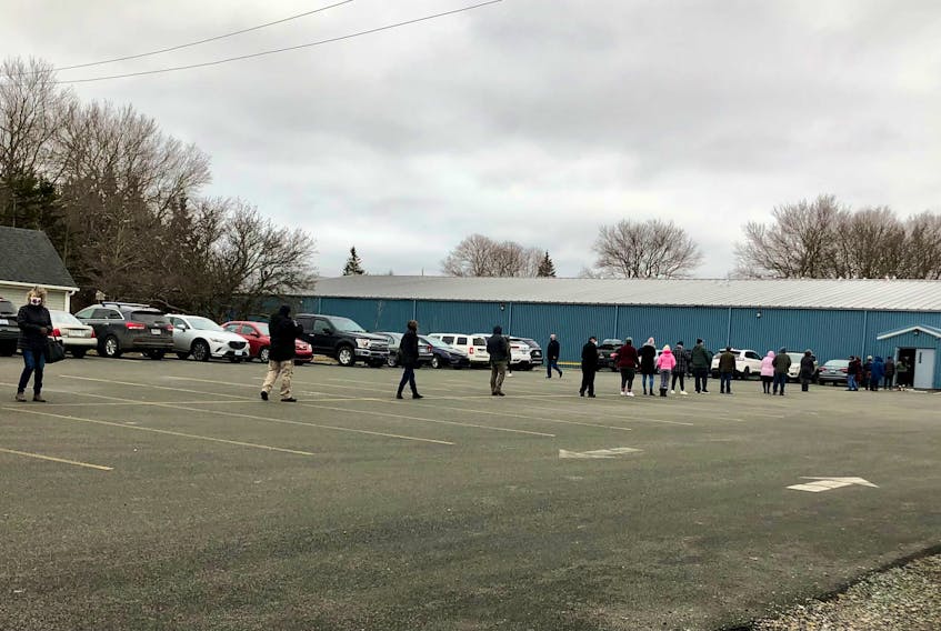 The lineup for COVID-19 rapid tests outside the popup clinic at the Sydney Mines and District Community Centre on Friday lasted for about 20 minutes after the door opened at 11 a.m. After that, there seemed to be little to no wait. NICOLE SULLIVAN/CAPE BRETON POST 