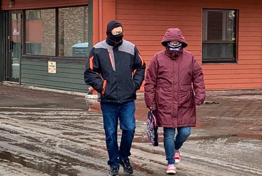 Jeff Clory, left, and his girlfriend Tammy Riley, enter provincial court in Charlottetown on Jan. 5 for sentencing. Clory was convicted on Nov. 10, 2021, for property damage for slashing Judge Nancy Orr's tires at the Georgetown courthouse. 