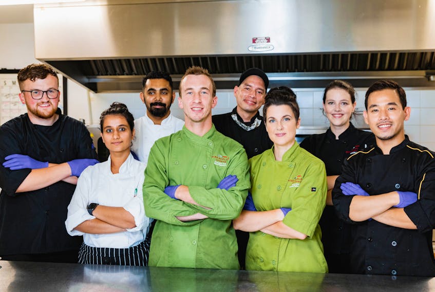 At one point, eight Nova Scotia Community College culinary management graduates worked as part of the Mise en Place kitchen team, roughly half of the total number hired. Back row, from left, are John Pronk, Jaron Jose, Robert Gould, Natalie Muise, and in the front row, from left, Kainwal Sindhu, Mark Paterson, Krista LeTerte and Patrick Tolentino. NSCC/MEL HATTIE