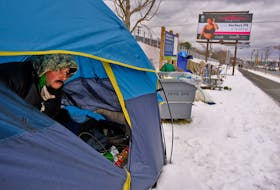 FOR PEDDLE STORY:
Mark, a man experiencing homelessness, looks out from his tent put up along Joe Howe Drive in Halifax Sunday January 9, 2022.

TIM KROCHAK PHOTO