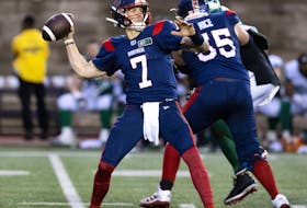 Montreal Alouettes quarterback Trevor Harris (7) throws against the Saskatchewan Roughriders in Montreal on June 23, 2022.