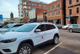 A Canadian Red Cross vehicle parked outside of the Confederation Court Mall. Hundreds of Islanders have lined up at the relief organization's office in the mall in recent days after being told they needed to verify their identity in order to receive a $250 cheque for storm-affected residents.