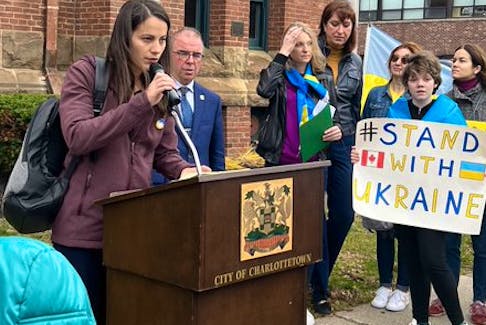 Elina Lialiuk, organizer of a weekend rally for the Ukrainian community of P.E.I. held in Charlottetown and calling attention to Russia as a state supporter of terrorism, spoke to those gathered in front of the Charlottetown City Hall, Oct. 15, 2022. - Grace Biswas/The Guardian