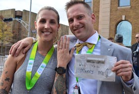 Samantha Legge, left, said yes to Scott Porter at the P.E.I. Marathon Oct. 16, 2022. Alison Jenkins • The Guardian